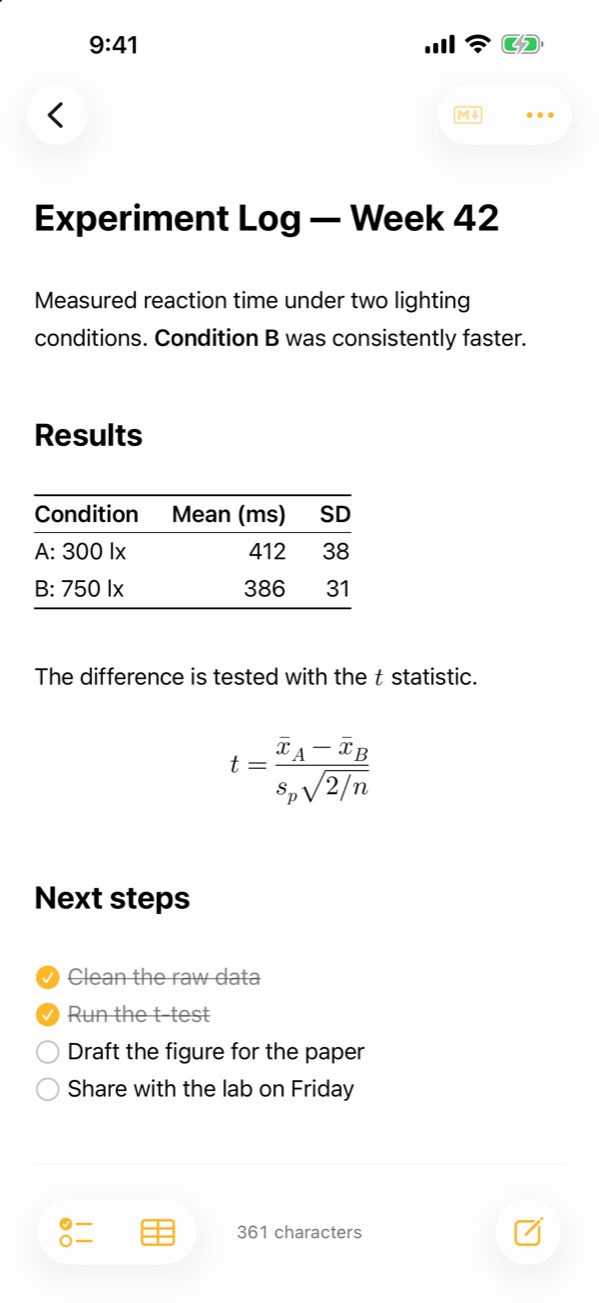 A note with the syntax hidden by the M↓ button, showing a typeset formula and a table with aligned columns and rules between rows.